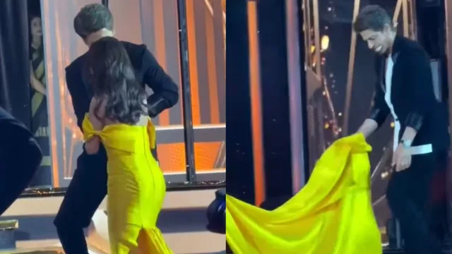 shah-rukh-khan-helps-nitanshi-goel-after-she-trips-gracefully-carries-her-gown-on-stage-viral-video