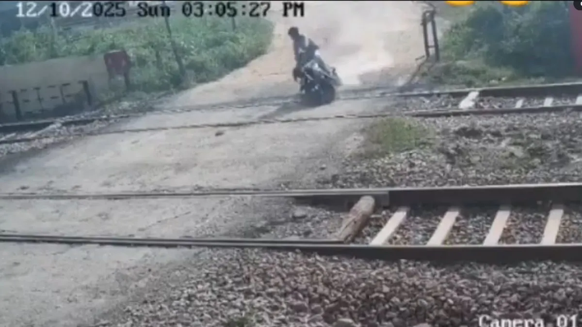 up-man-falls-off-bike-while-crossing-railway-tracks-hit-by-train-in-greater-noida-watch-video