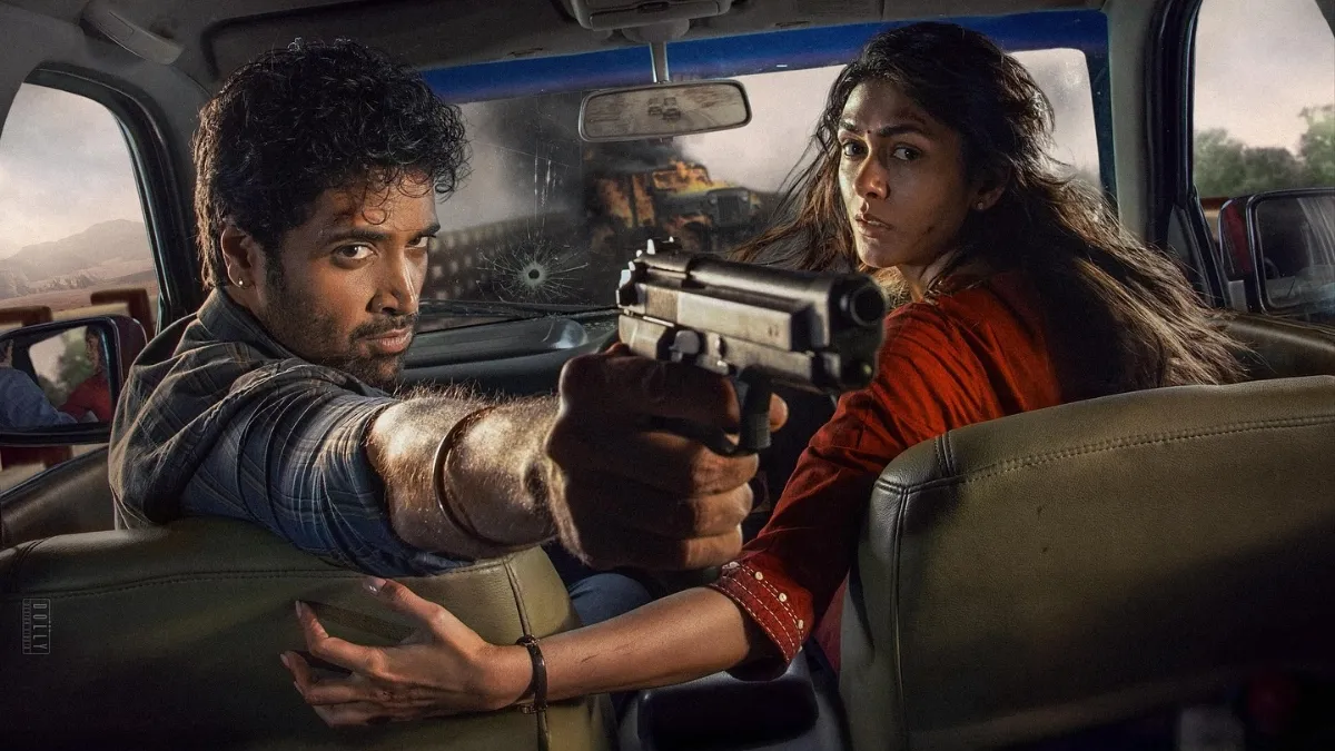 dacoit-new-release-date-announced-mrunal-thakur-and-adivi-sesh-promise-highoctane-action-in-intense-new-poster