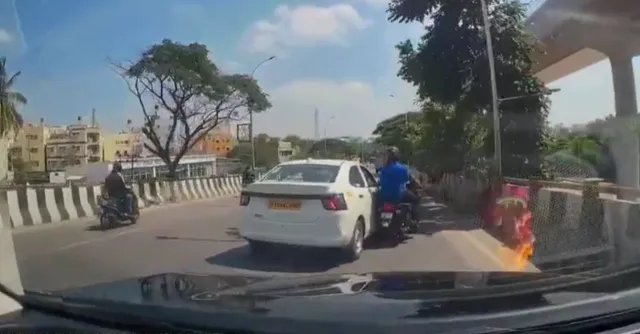 bengaluru-road-rage-cab-driver-hits-twowheeler-near-kr-puram-bridge-after-argument-with-bikers-video