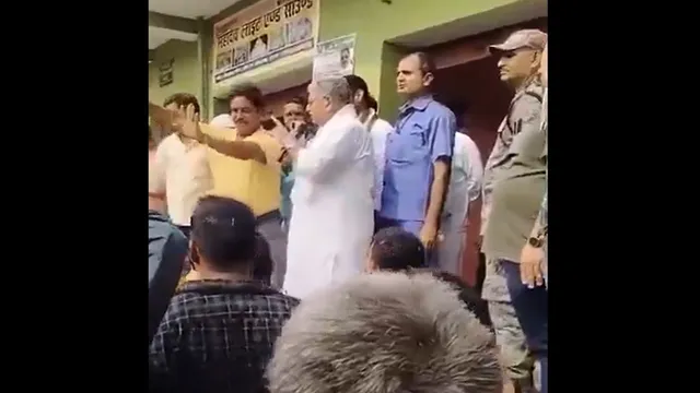 bihar-elections-2025-fir-against-jdu-leader-lalan-singh-after-rjd-congress-flag-his-ghar-se-bahar-nahi-nikalane-do-viral-video