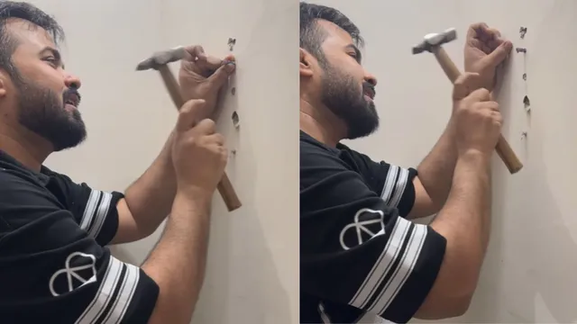 noida-man-hammers-pencil-into-wall-of-his-rs-1-5-crore-flat-viral-video-raises-quality-concerns-video