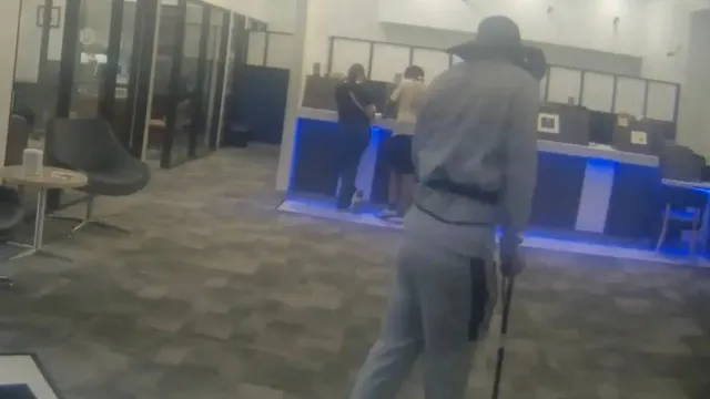 caught-on-cam-man-disguised-with-fake-limp-and-neck-brace-robs-louisiana-bank-then-sprints-away