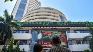 Indian Stock Markets Open Flat In Highly Volatile Session; Investors Eye US-India Trade Deal, Bihar Poll Results
