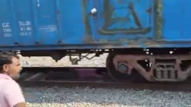 man-cheats-death-as-he-crawls-under-moving-train-in-telangana-viral-video