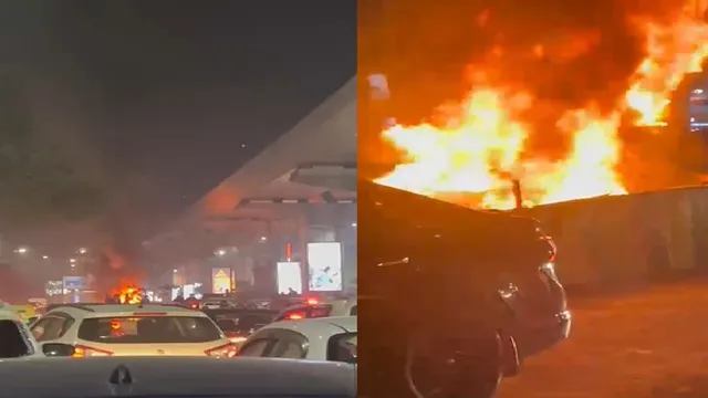 noida-fire-car-erupts-into-flames-near-sector76-metro-station-massive-traffic-jam-amid-peak-hour-rush-video