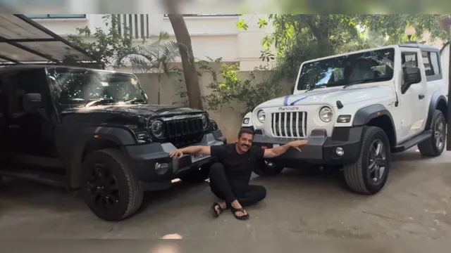watch-bollywood-actor-john-abraham-now-buys-3-door-mahindra-thar-also-owns-a-bespoke-thar-roxx