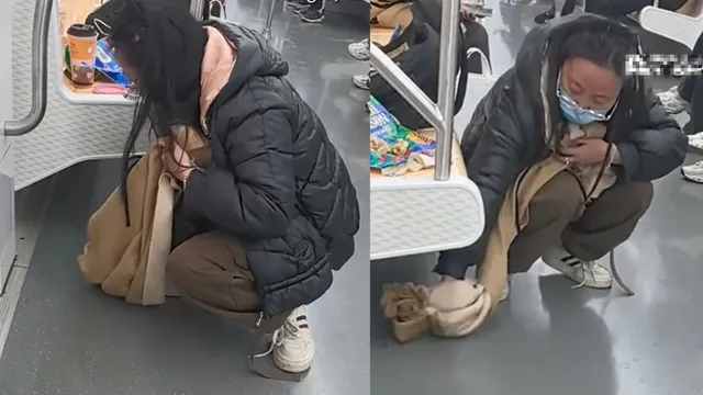 chinese-woman-spills-bubble-tea-cleans-subway-floor-with-her-own-scarf-desis-ask-india-kab-sikhega-video