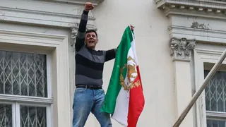 Why Protesters Replaced Iran's Regime Flag With Pre-1979 'Lion And Sun' At London Embassy Amid Protests | VIDEO
