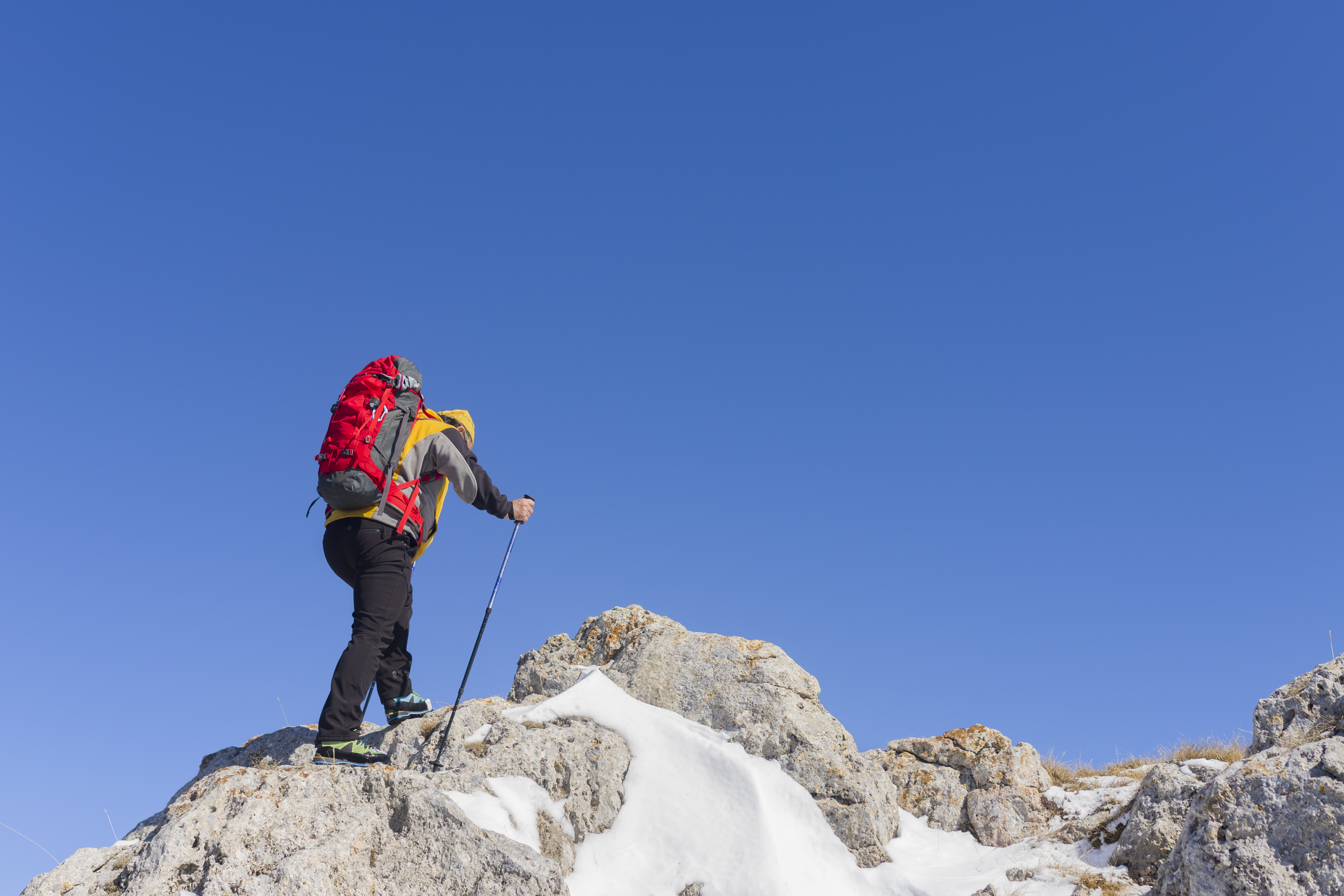 a person climbing mountain