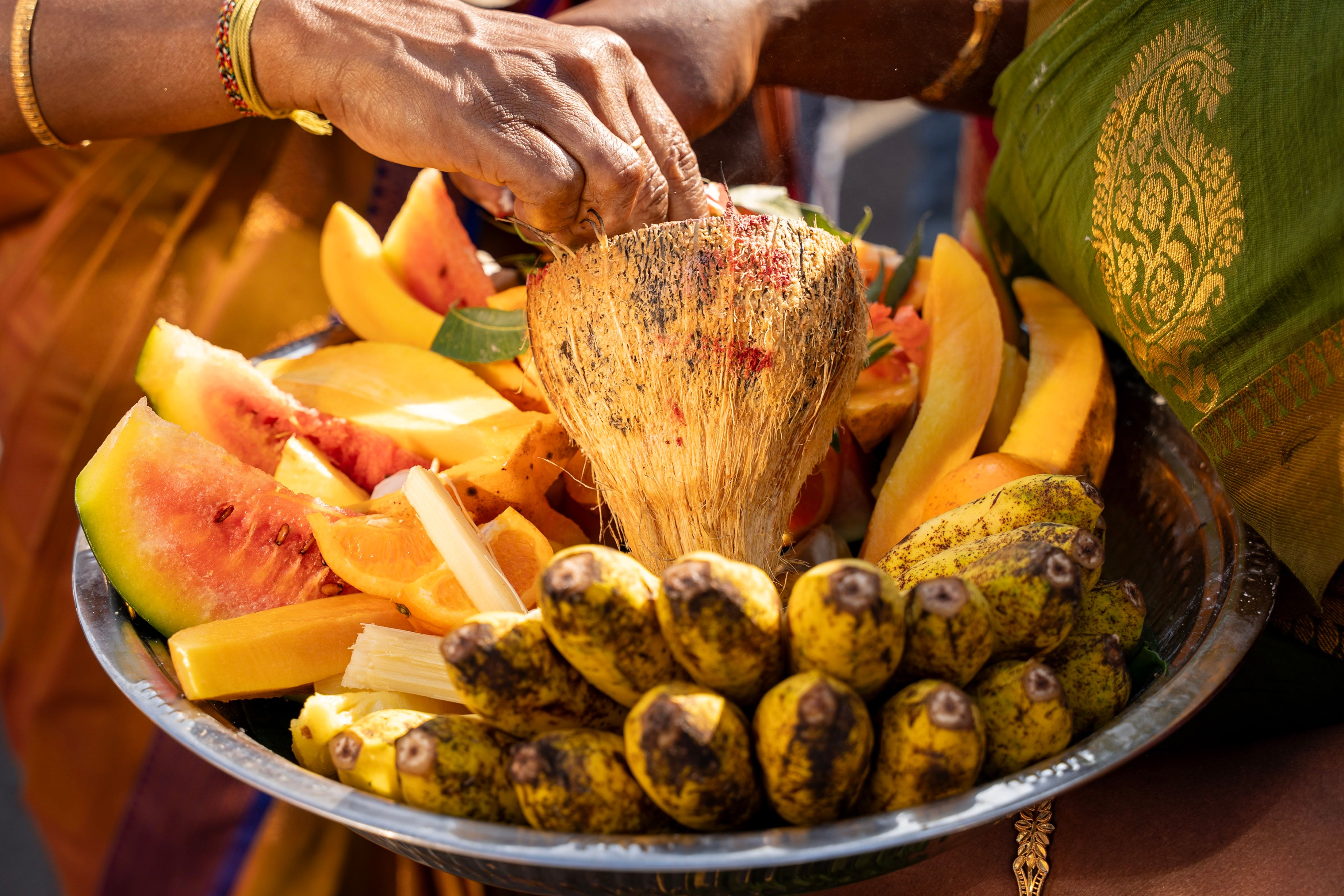 breaking of the coconut is symbolised as a bloodless sacrifice and has been offered in temples to gods