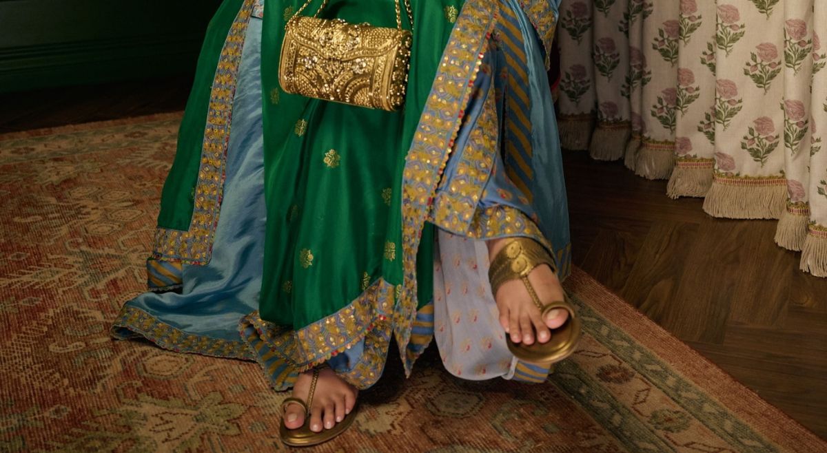 footwear with green saree and suit