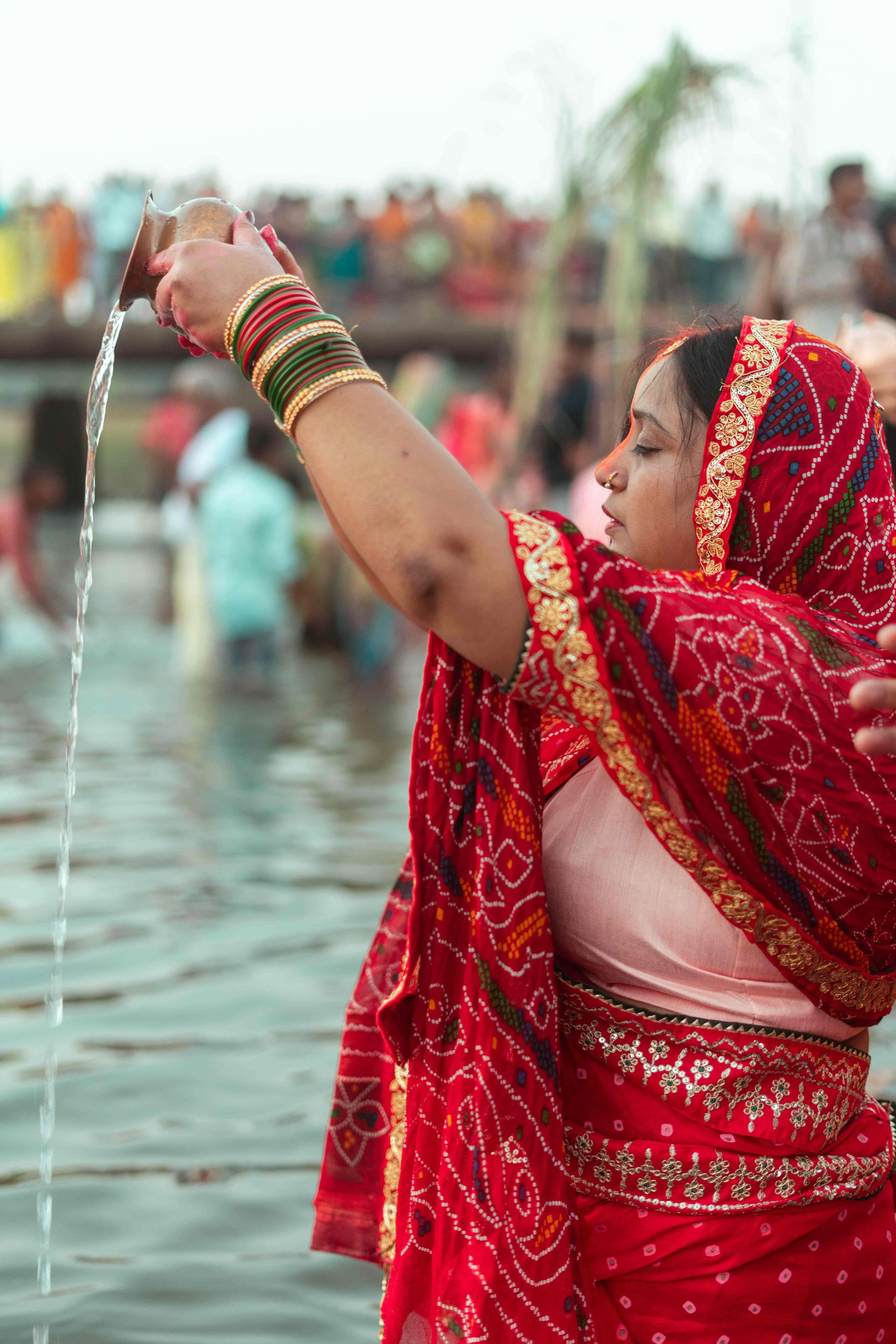 offering water to the sun