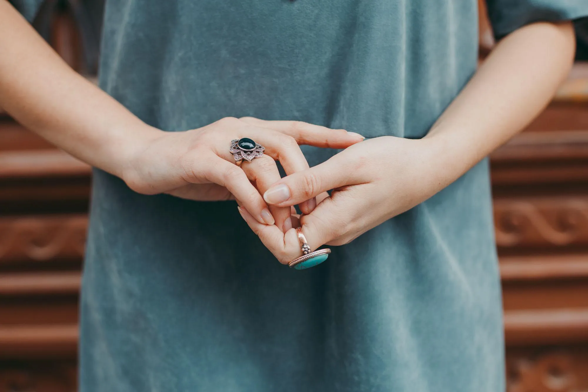 person wearing gemstones
