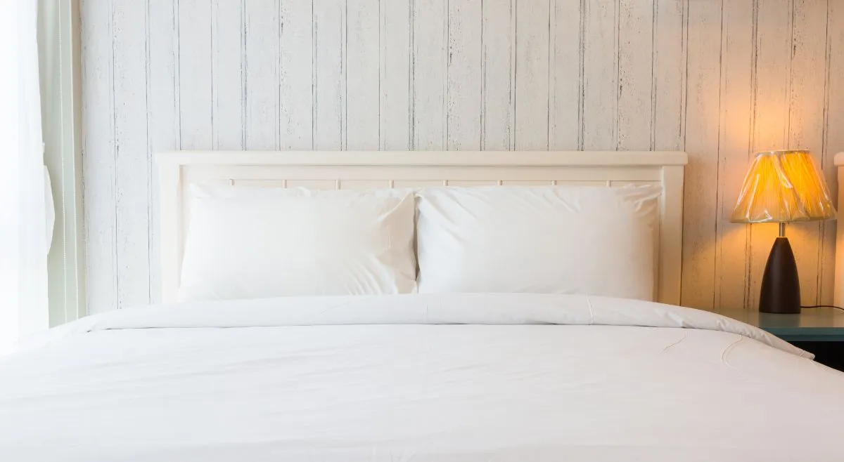 White Bedroom With Statement Lighting