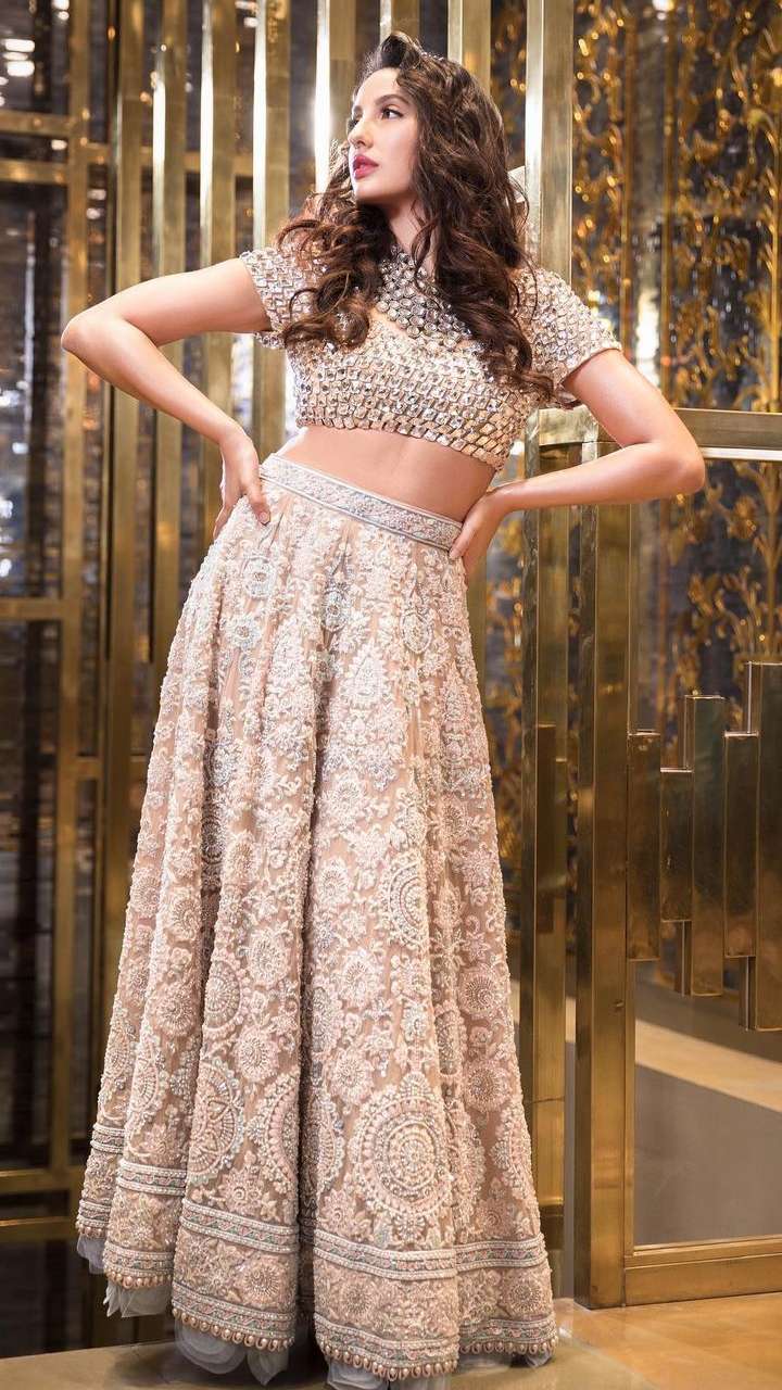 Nora Fatehi in pearl blouse and chikankari lehenga will leave you  spellbound. New video - India Today