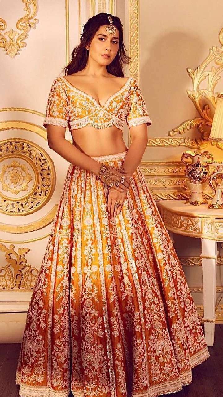 Photo of Stunning bridal portrait of an indian bride wearing hot pink  lehenga