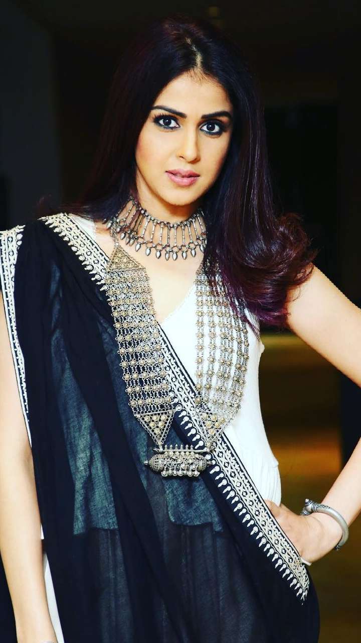 fashion__jwell - Black Saree ,Black mirror work blouse, silver jewellery .  Coin earings, flower waist belt and silver oxidised necklace . All this  looks stunning when styled together. #jwellerylove #jewelry #jwellary  #jwellerydesigner #