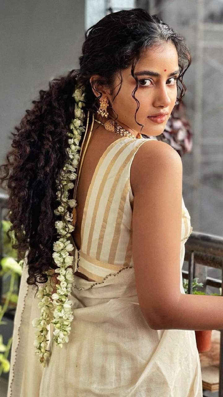 cute and perfectly Indian Aryan pretty girl with long curly hair