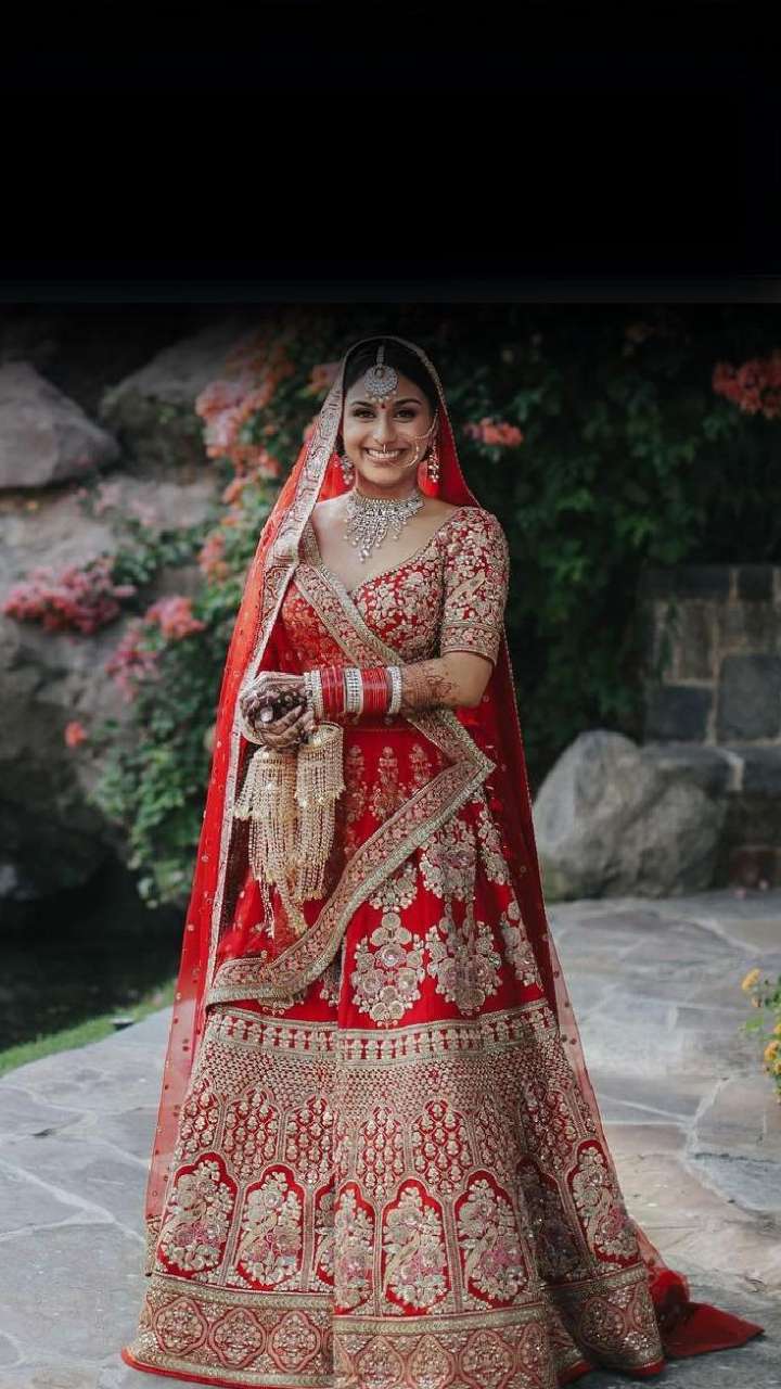 Sabyasachi Bride Stuns In A Red Lehenga With Golden Work, Pairs With Loud  Polki Diamond Jewellery