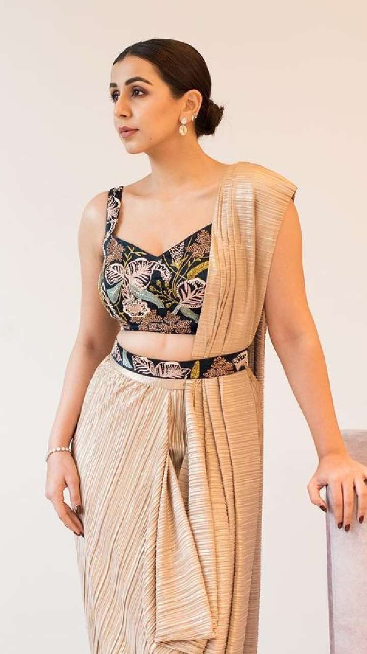 Nikki Galrani's The Most Stylish Back V-Neck Blouse Design  Curvy girl  outfits, Blouse neck designs, Unique blouse designs