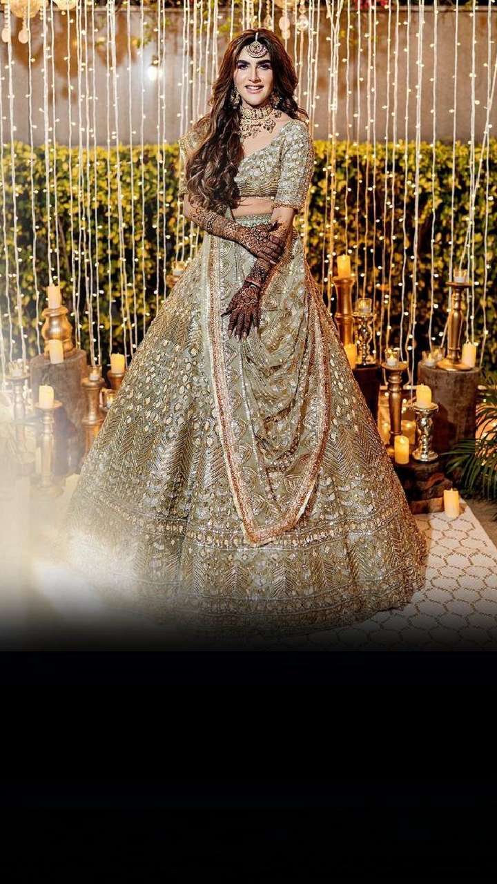 SK Ravishing Fashion - Golden bridal / semi bridal lehenga choli with red  dupatta embellished with stone and golden zari work. For more info please  call or msg #yeg, #indianoutfit, #lehengacholi, #golden, #